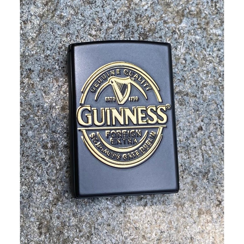 Korek Api Slide Hitam Motif Guinness Refill Butane PVC Premium Desain Eksklusif Ringkas & Tahan Lama