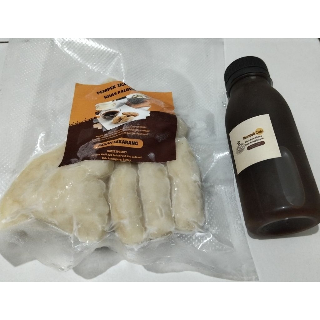 

PEMPEK KAPAL SELAM KHAS PALEMBANG IKAN TENGGIRI ASLI 2 PCS UKURAN SEDANG + CUKO 125 ML