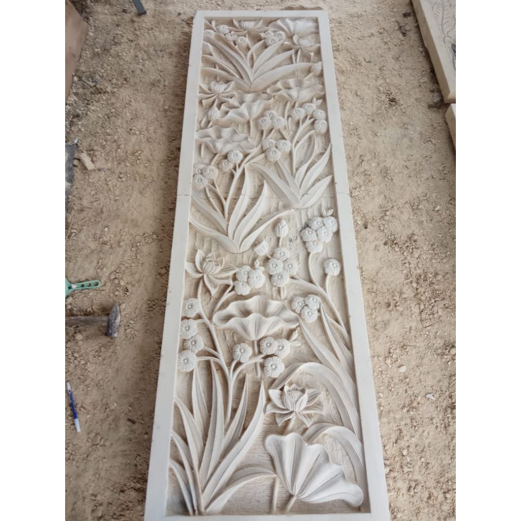 relief ukir batu paras jogja motif bunga