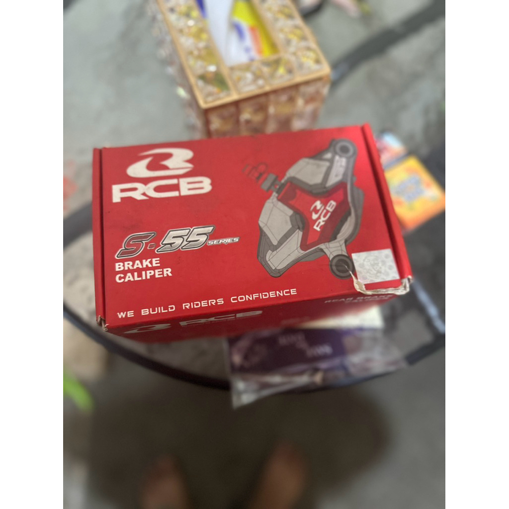 kaliper rcb s55 kanan . (bekas rasa baru)