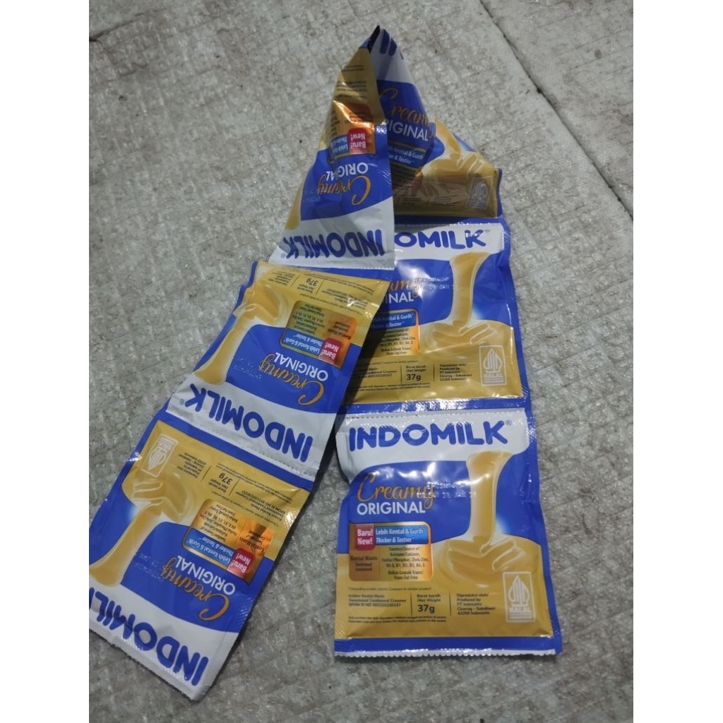 

Susu indomilk kental manis renceng (isi 6pcs) kemasan 37gr