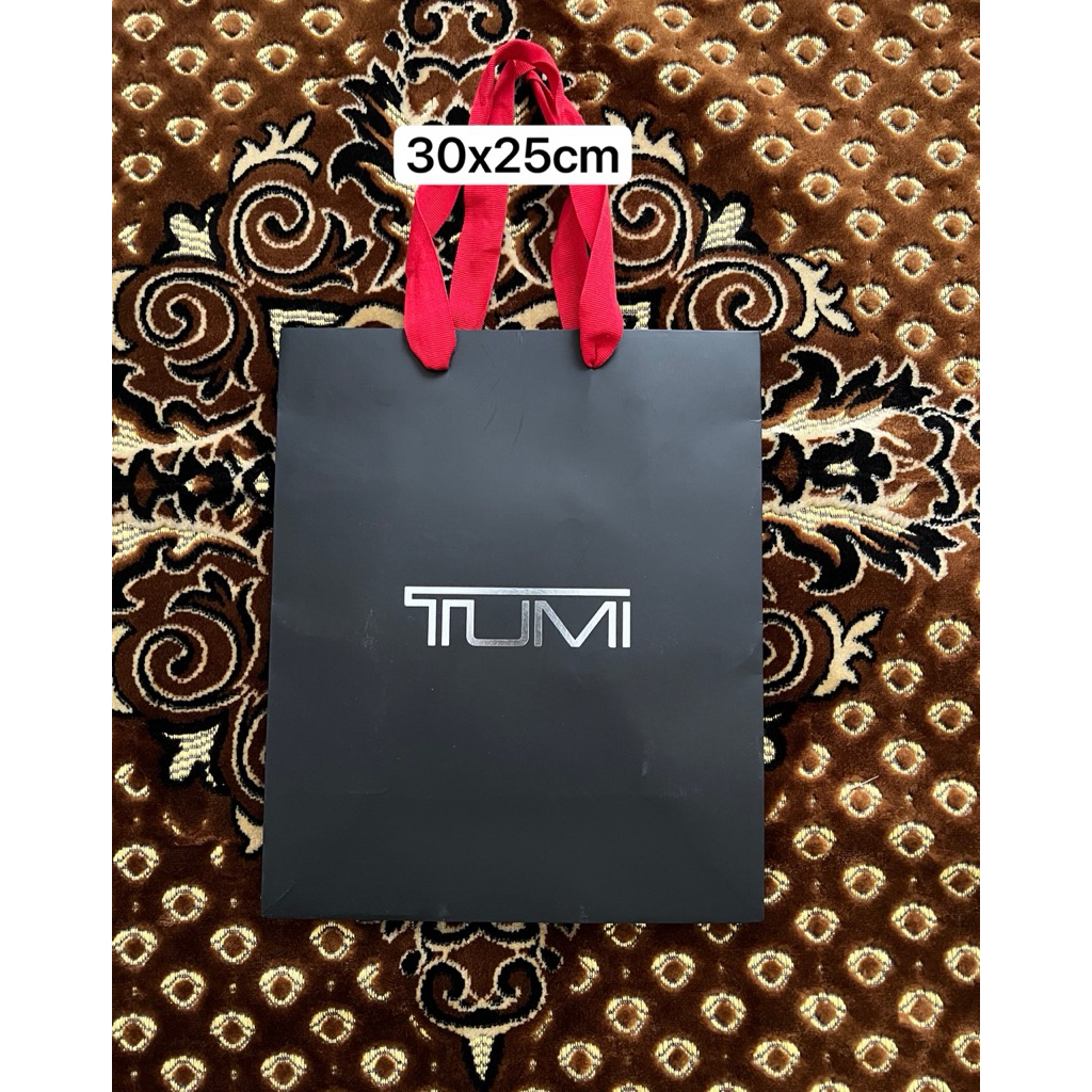 

Tas paper bag Tumi