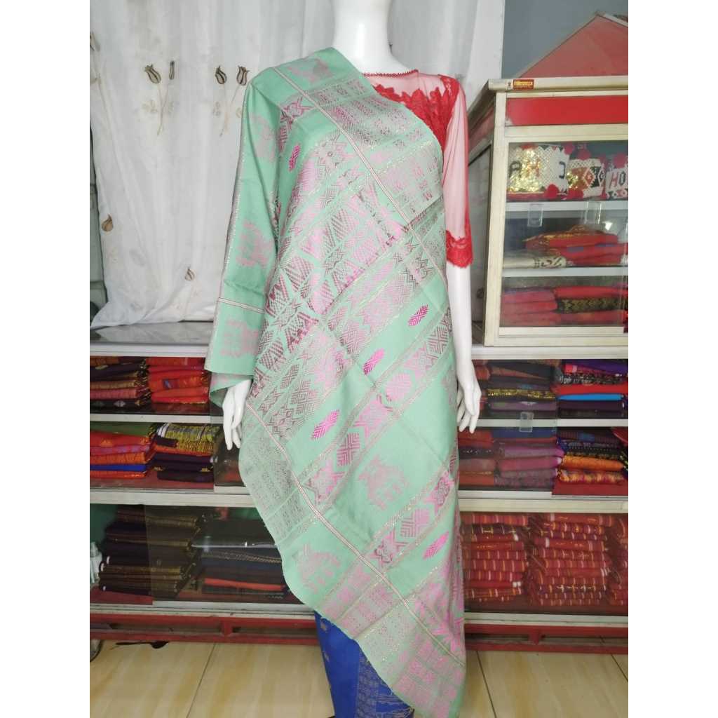 UIS NIPES WARNA DASAR HIJAU MINT DENGAN MOTIF RUMAH ADAT