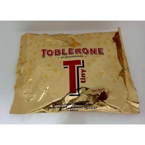 

Cokelat Snack Singapore [READYSTOCK EXP 12/25] | AUTHENTIC TOBLERONE MINIS TINY Made in Switzerland 200 gram (TOBLERONE Tone Gold Mini Bag 200g) | Jajan Impor | Jastip Coklat Cokelat Coklat Original Oleh-Oleh Jastip S