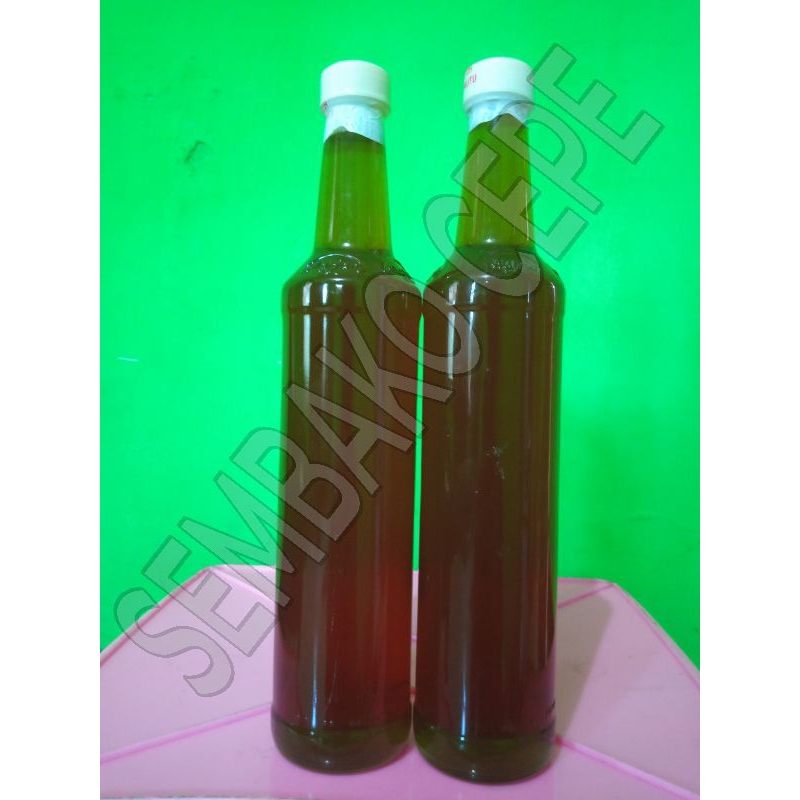 

Madu murni kemasan 660 ml ukuran botol marjan murni tanpa campuran