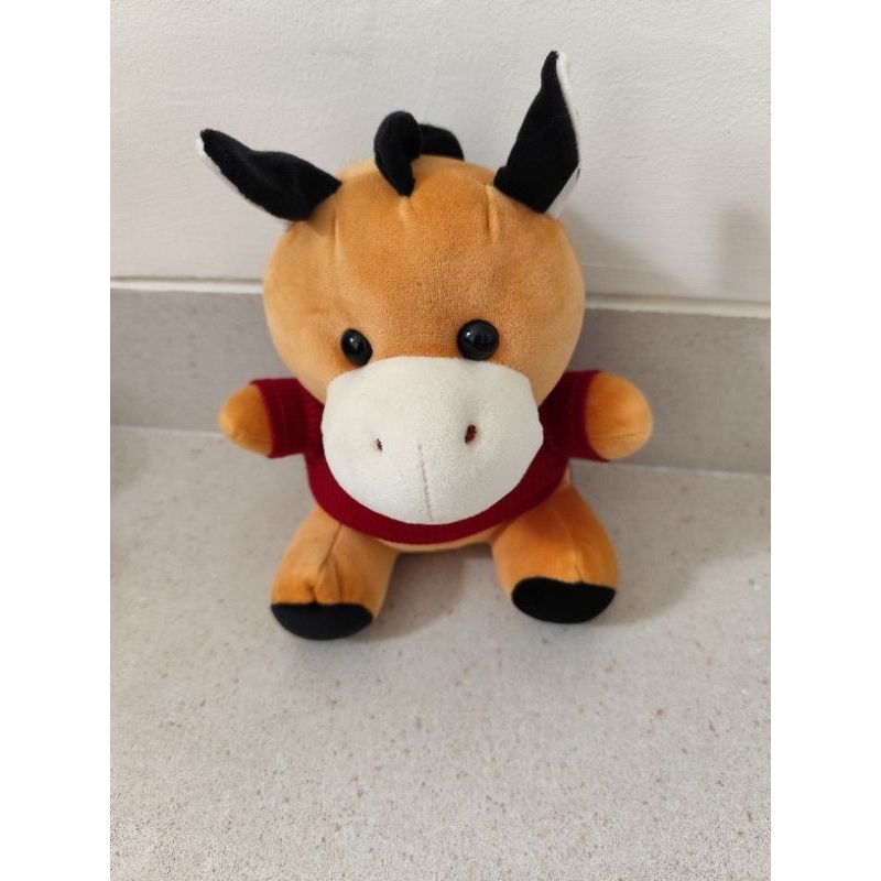 boneka kerbau lucu hasil capitan