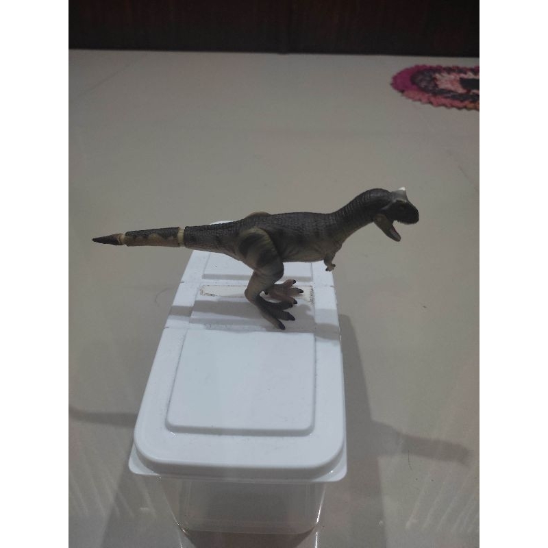 figure tomy ania dinsosaurus carnotaurus