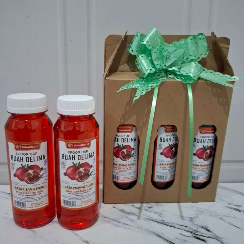 

sirup pisang susu tjap buah delima