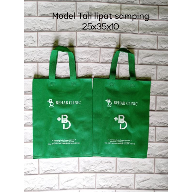 

25x35x8cm tas spunbond goodie bag request sablon
