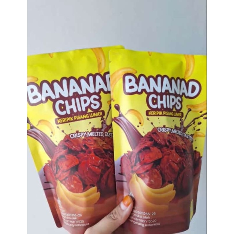 

KERIPIK PISANG LUMER BANANAD CHIPS RASA COKLAT KERIPIK PISANG LUMER BERSALUT COKLAT 100GRAM