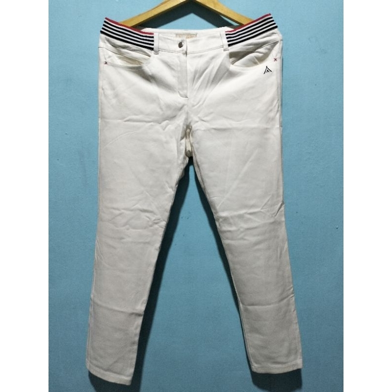 Celana jeans panjang warna putih wanita