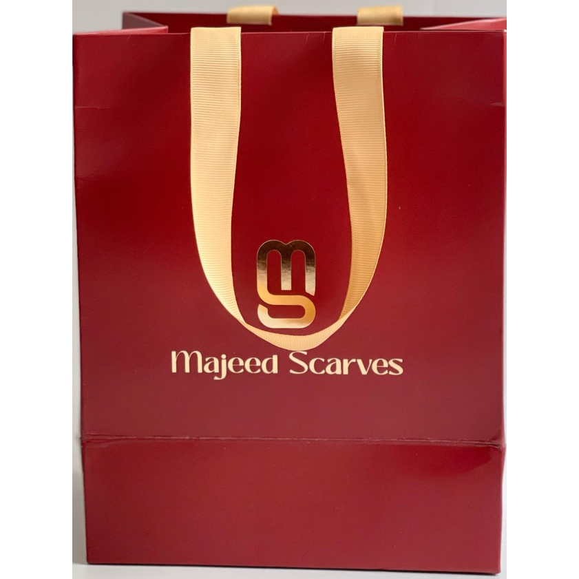 

Paper bag Majeed Scarves