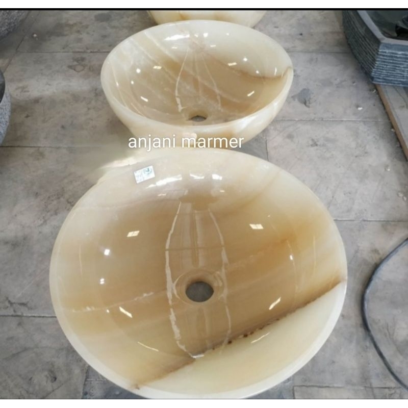 Wastafel batu onyx design tipis