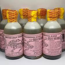 Minyak Urut Tradisonal Karo Minyak Urut Cap Biawak