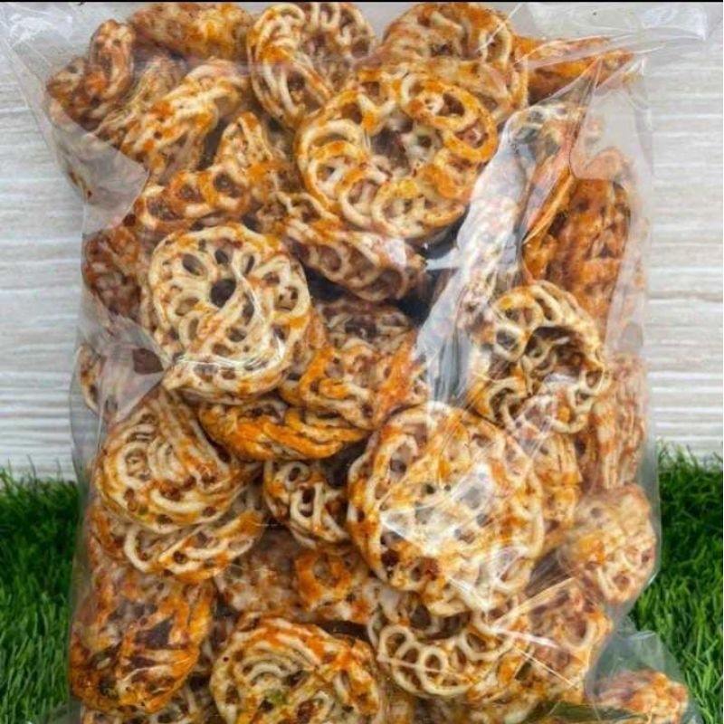 

KERUPUK SEBLAK KERING RAFAEL PEDAS DAUN JERUK 250 gram