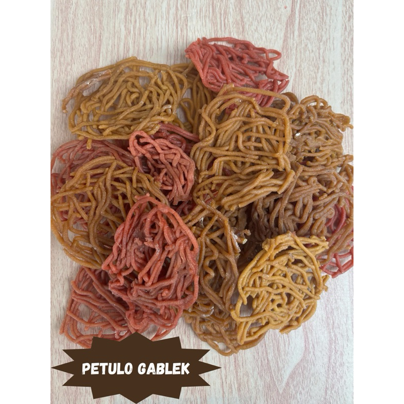 

Kerupuk mentah petulo gaplek bawang tunggal berat 1 kg 500gr 250gr