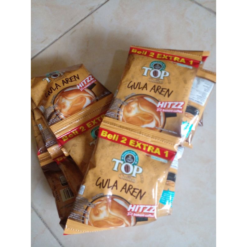 

Top Coffee Gula Aren Kemasan 1 Renteng Isi 15 Bungkus