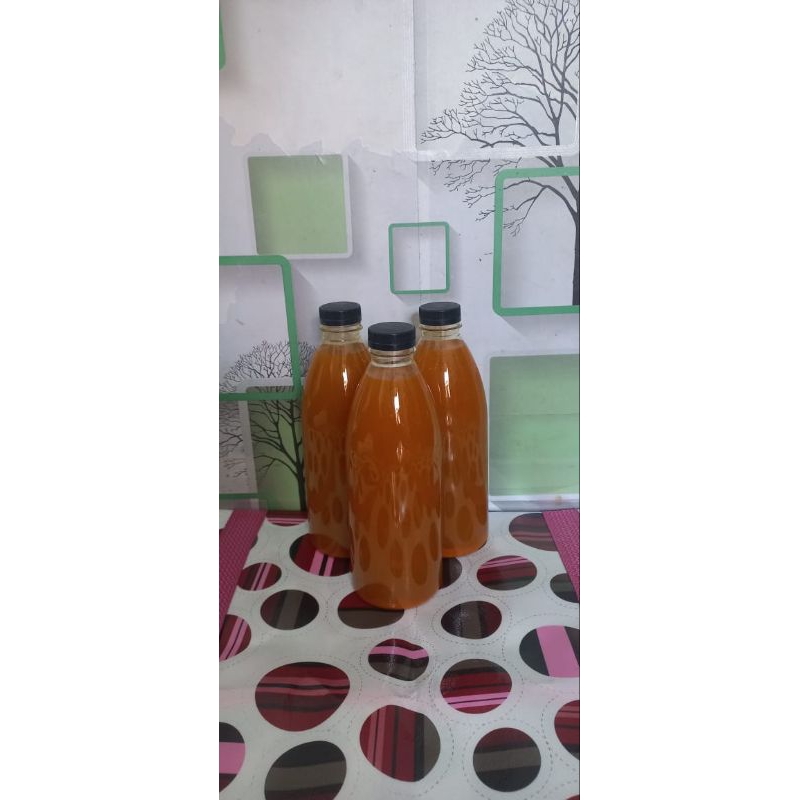 

Jamu Tradisional Kunyit Asem Gula Merah Kemasan Botol Plastik 600ml,