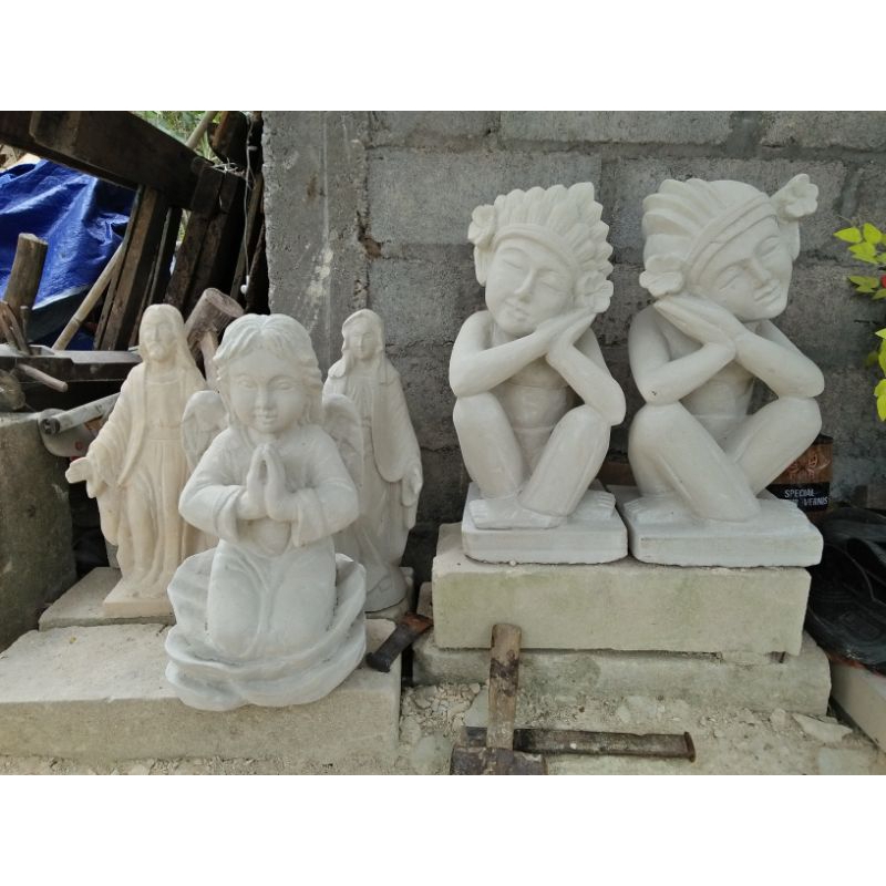 Batu alam dinding rumah patung bali