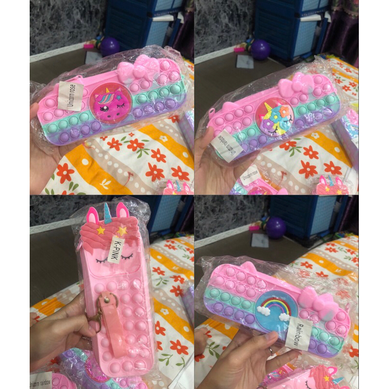 

Tempat Pensil Pop It Unicorn Rainbow Alat Sekolah