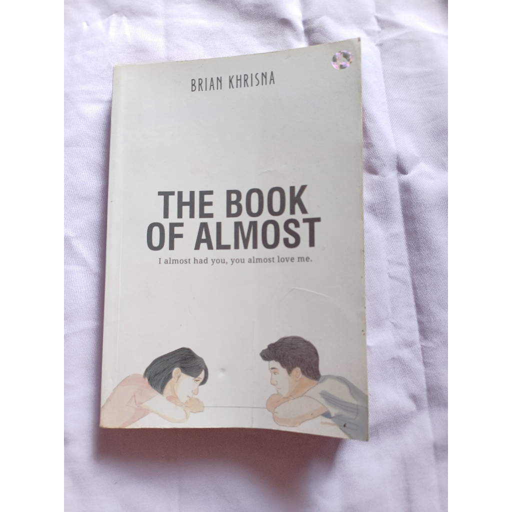 PRELOVED BUKU THE BOOK OF ALMOST-BRIAN KHRISNA