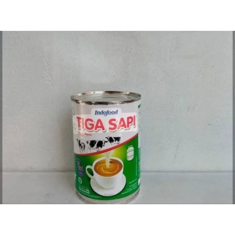 

KENTAL MANIS TIGA SAPI 490 GRAM( 1 KALENG ) ,dairy 480 gram