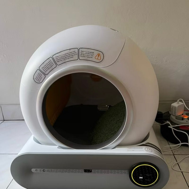 Litter box kucing otomatis