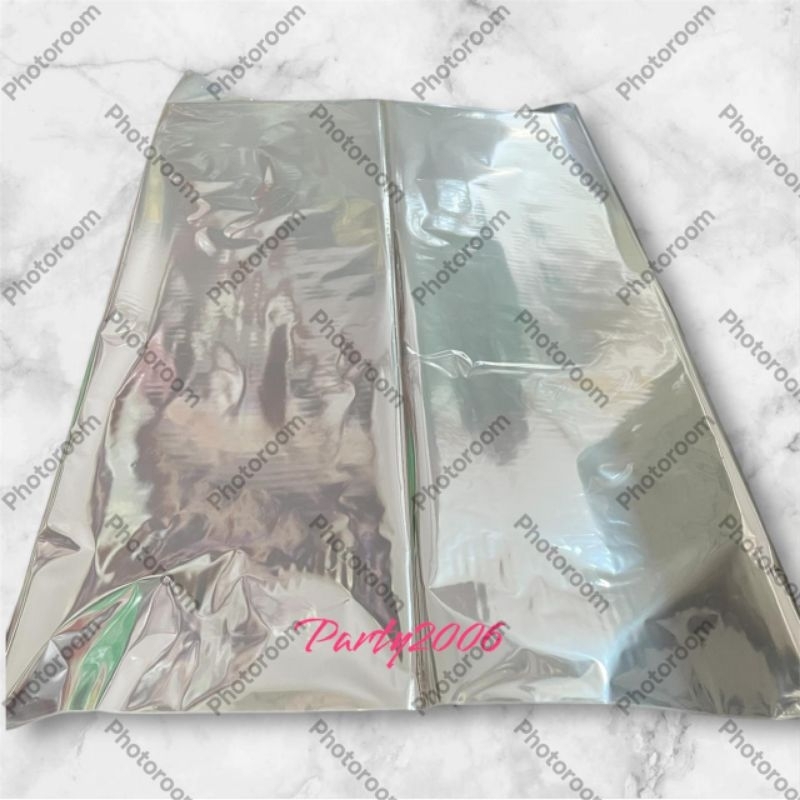 isi 10lembar Plastik Parcel polos 90×100cm  / plastik bening polos
