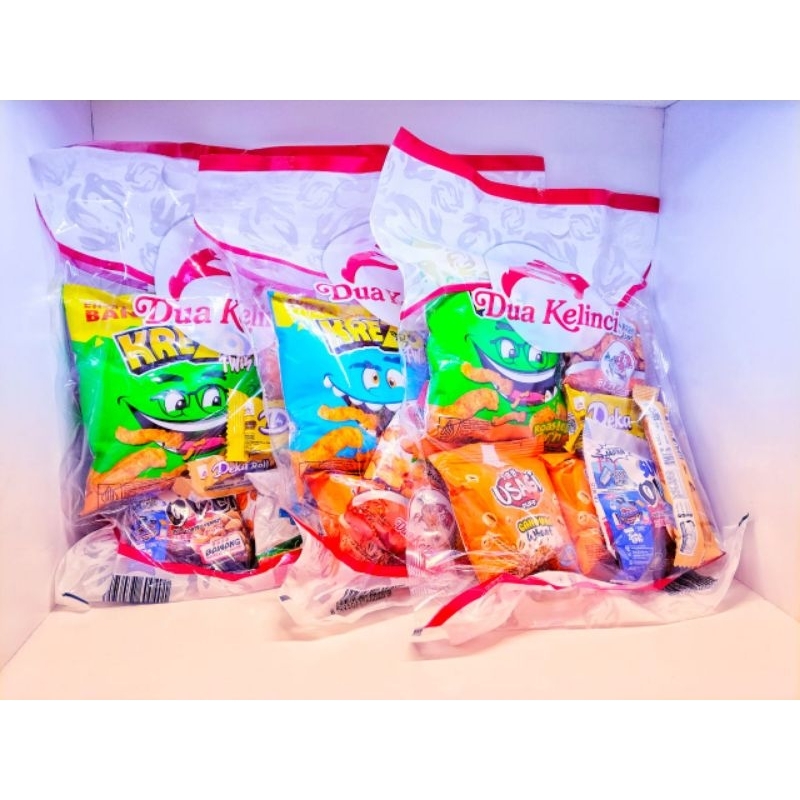 

Dua Kelinci Snack Paket Jajanan Isi 11 Buah Camilan