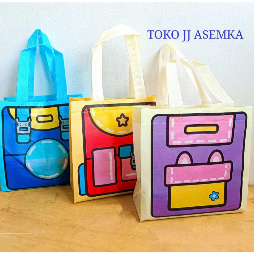 

TAS SPUNBOND MODEL RANSEL PAPERBAG SOUVENIR KADO GOODIE BAG LUCU UNIK MURAH COD