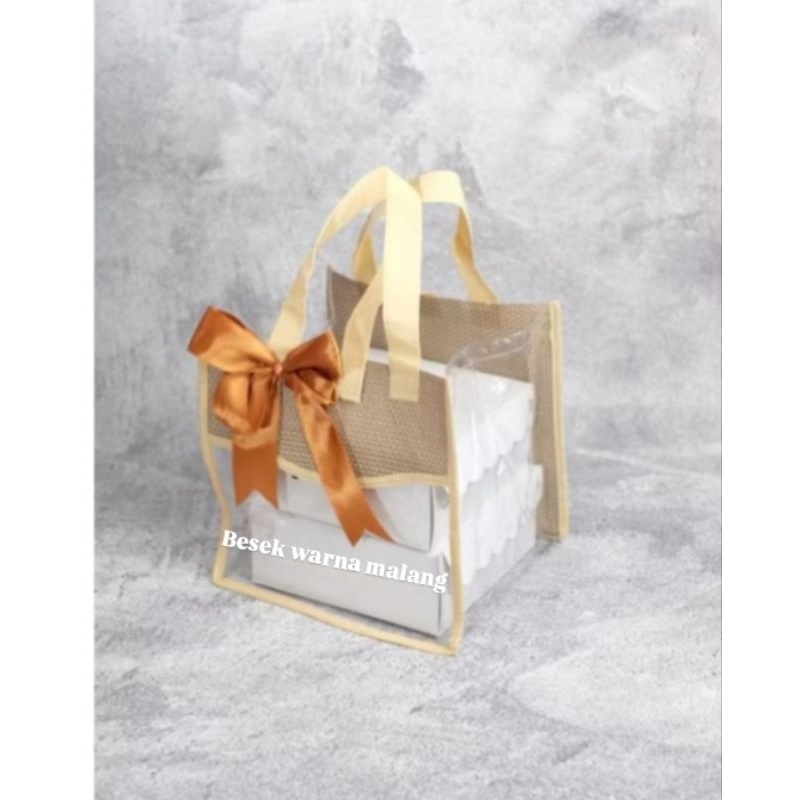 

tas mika dengan modifikasi kulit sintetis (diameter 23x23) free pita