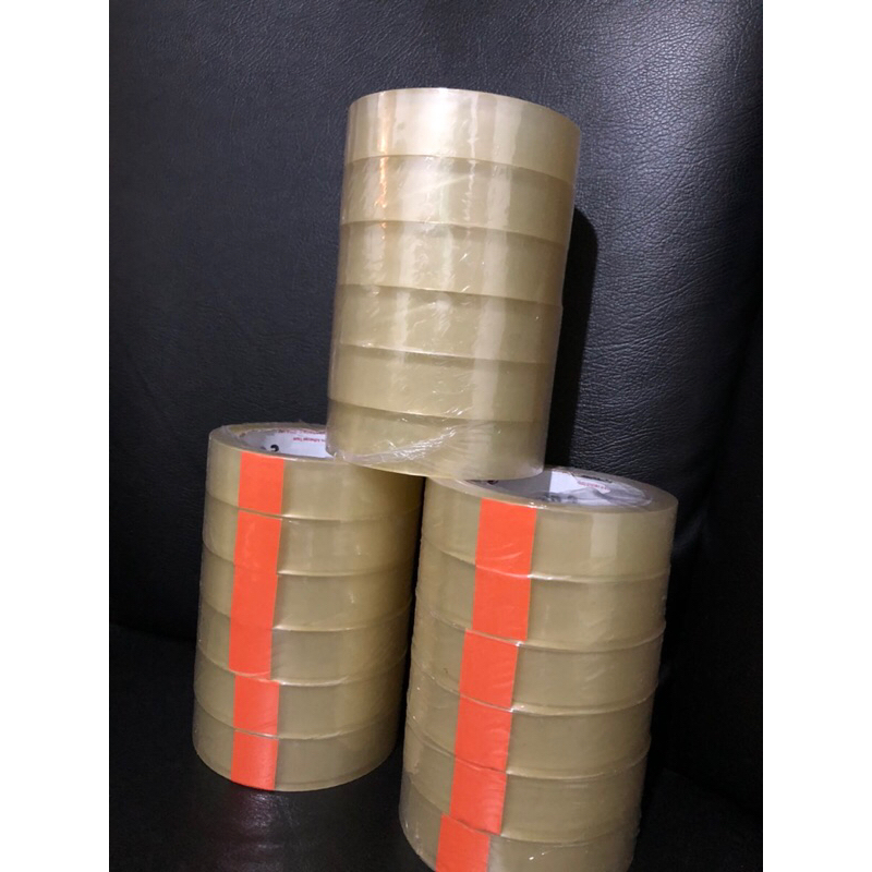 

Lakban / Solasi / Solatip Bening Transparan 1 inci 2mm 1 roll isi 6 pcs