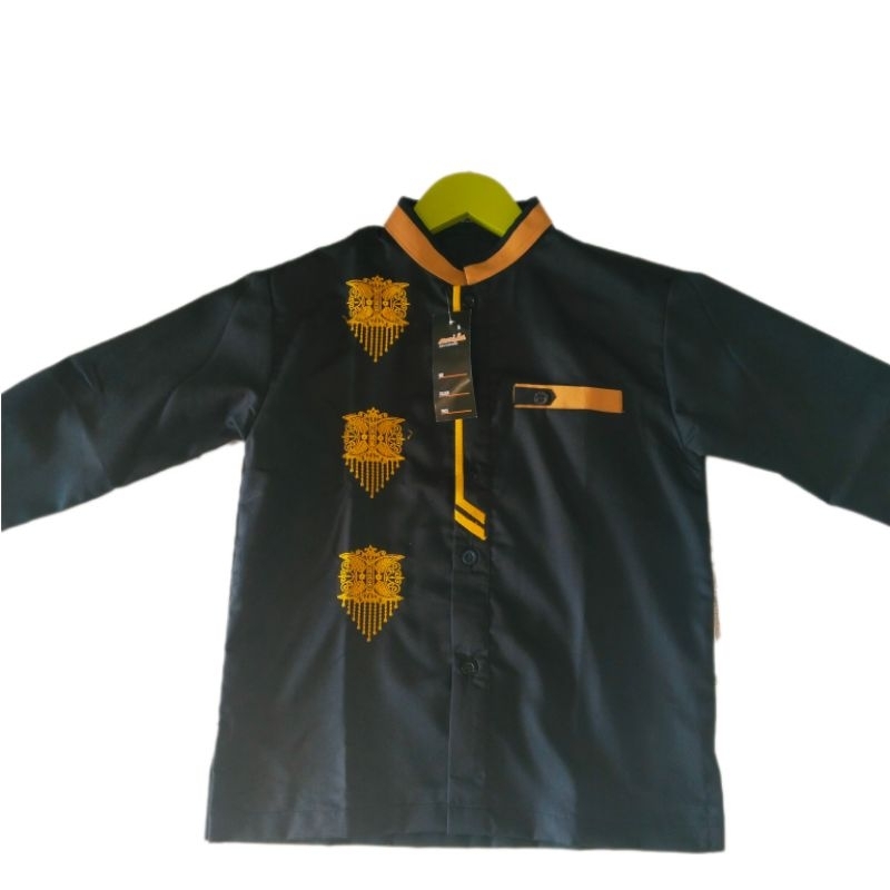 baju anak motif pintu aceh
