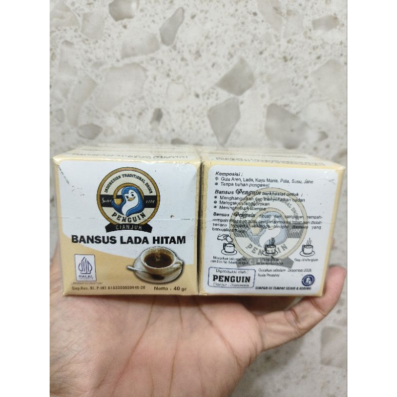

Bandrek Susu Lada Hitam Penguin Kemasan 1 Pack isi 10 Bungkus