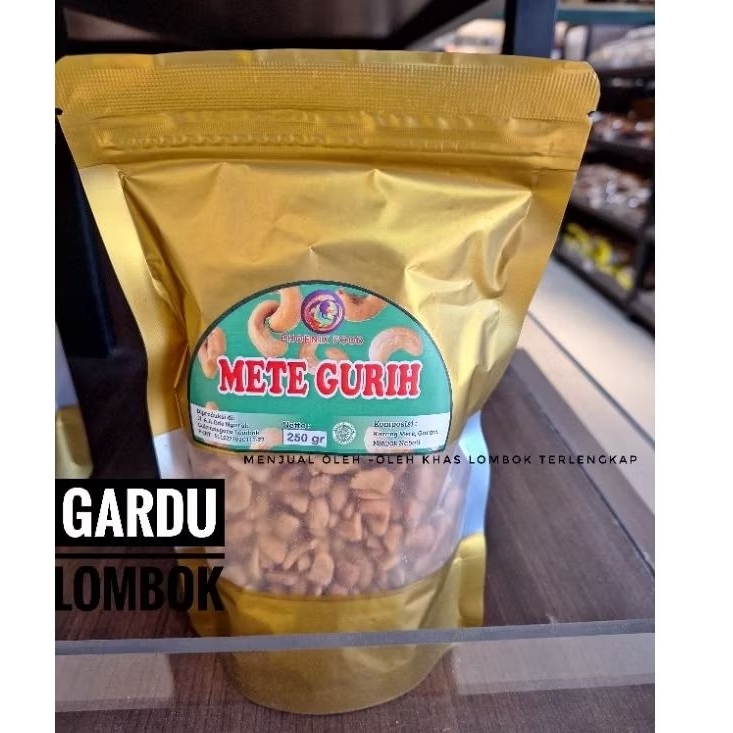 

Kacang Mete Phoenix pecahan / rasa gurih netto 250 gr Khas Lombok
