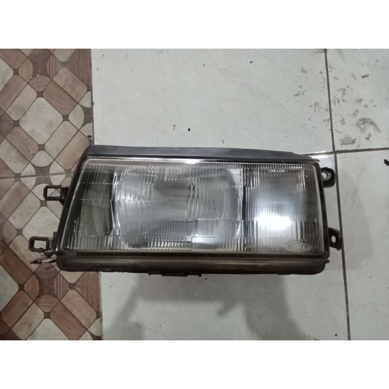 Headlamp Ford Laser kiri