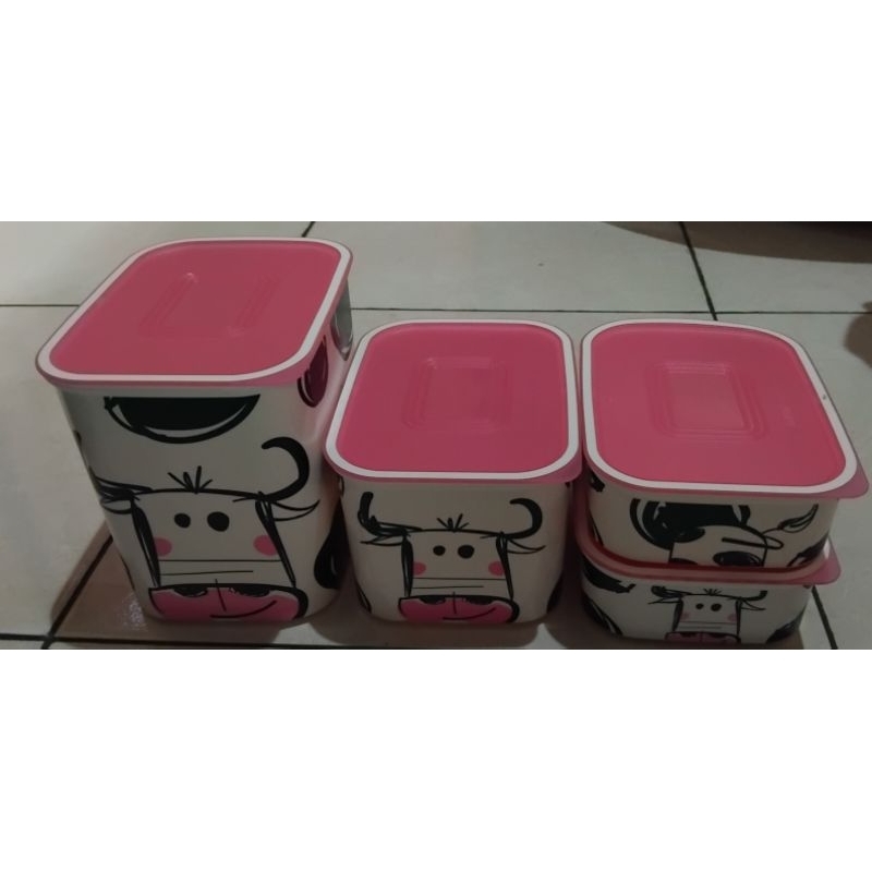 tupperware baseline moo cow canister set