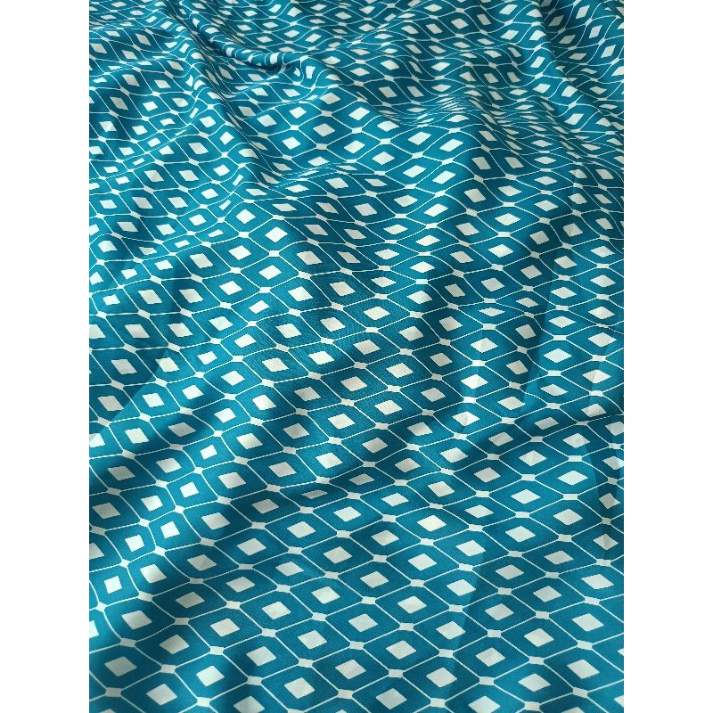 kain silk motif abstrak warna biru