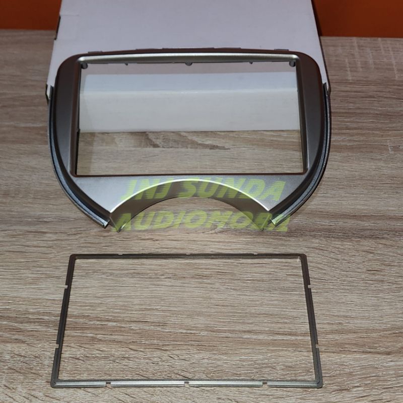 Frame head unit android 7 inch mobil nissan march 2010-2015