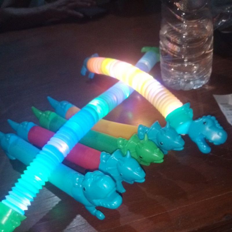 pop lead tube dinosaurus mainan