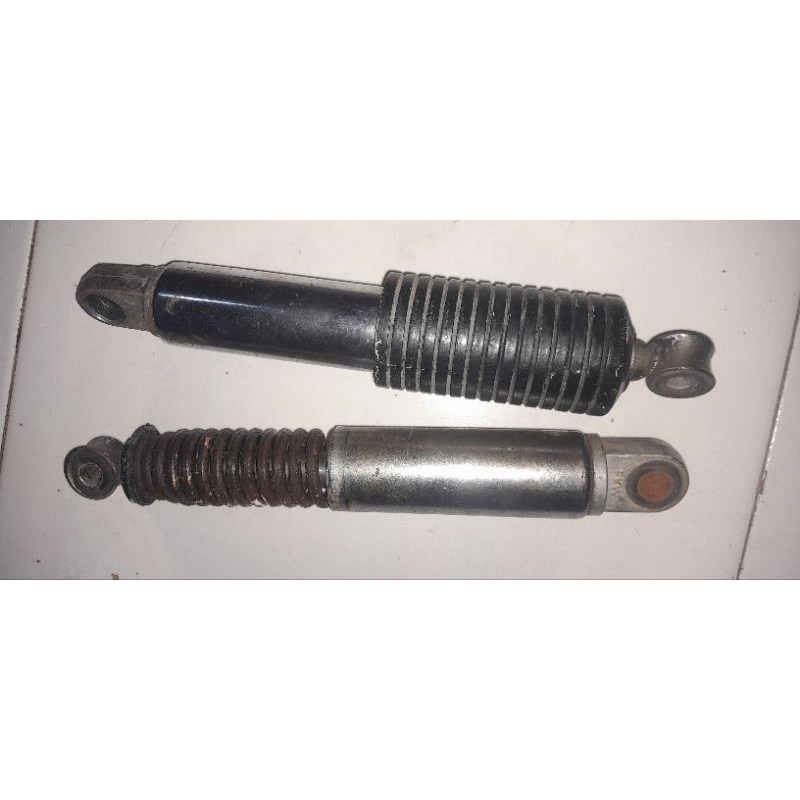 shock belakang rc 100