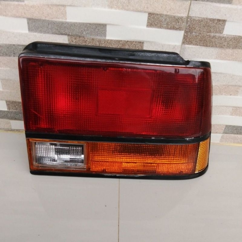 setoplem lampu belakang Toyota Corolla GL SE 84-87 original copotan bagian kiri