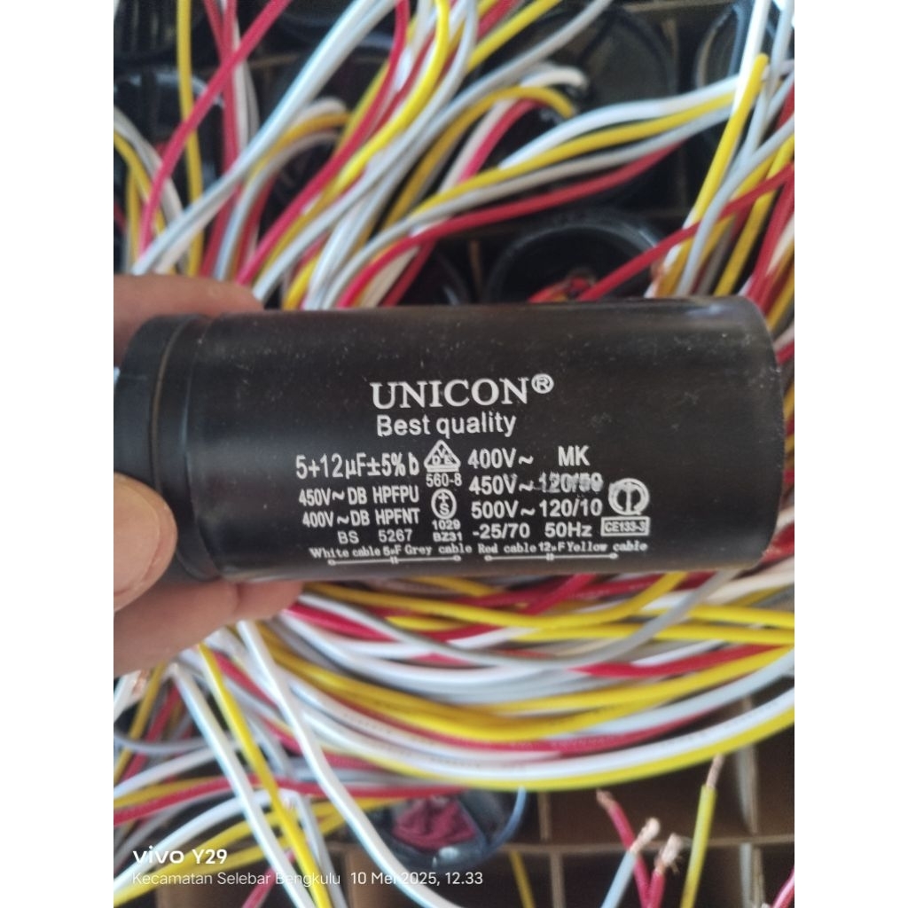 Capasitor mesin cuci