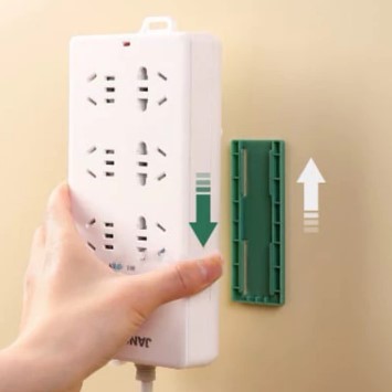 Holder Stop Kontak Gantungan Papan Colokan Alat Pengait Remote TV AC Tempel Meja Dinding Router Wifi
