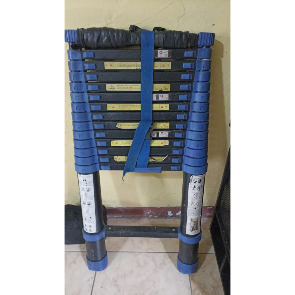 tangga teleskopik 4,4m bekas normal