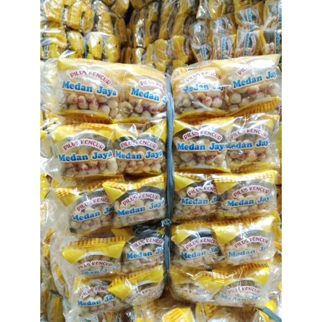 

MEDAN JAYA Pilus Kencur Uk 10gr+ 1 Paket isi 5 Ball ( 1 Bal isi 40 Pcs ) Exp Aman Renyah & Gurih
