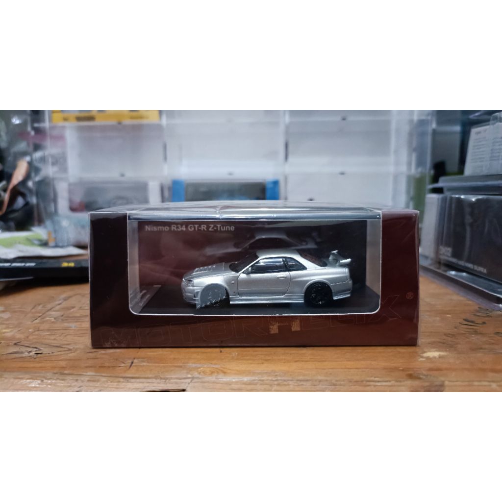 MOTORHELIX NISSAN SKYLINE GTR R34 NISMO Z TUNE SILVER