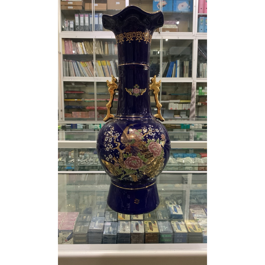 GUCI TRADISIONAL CINA BERMOTIF