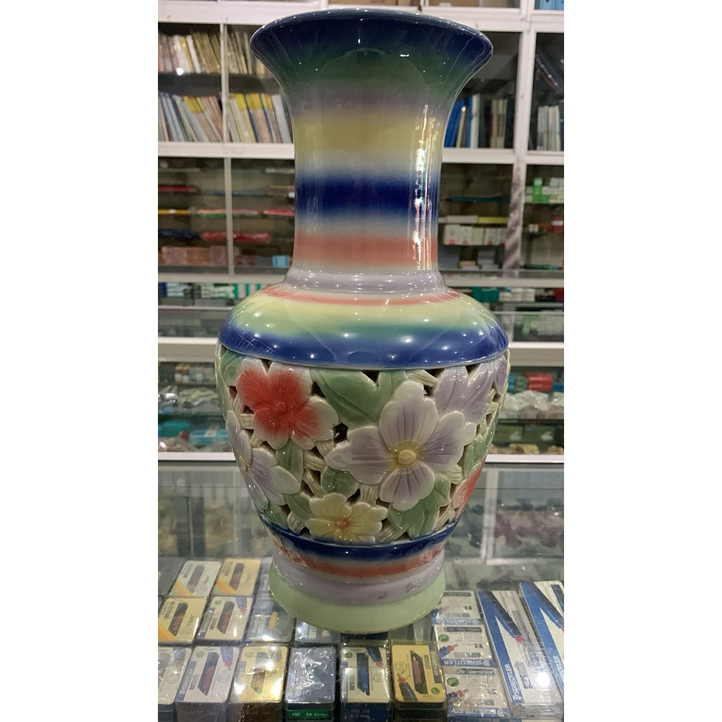 GUCI TRADISIONAL CINA BERMOTIF