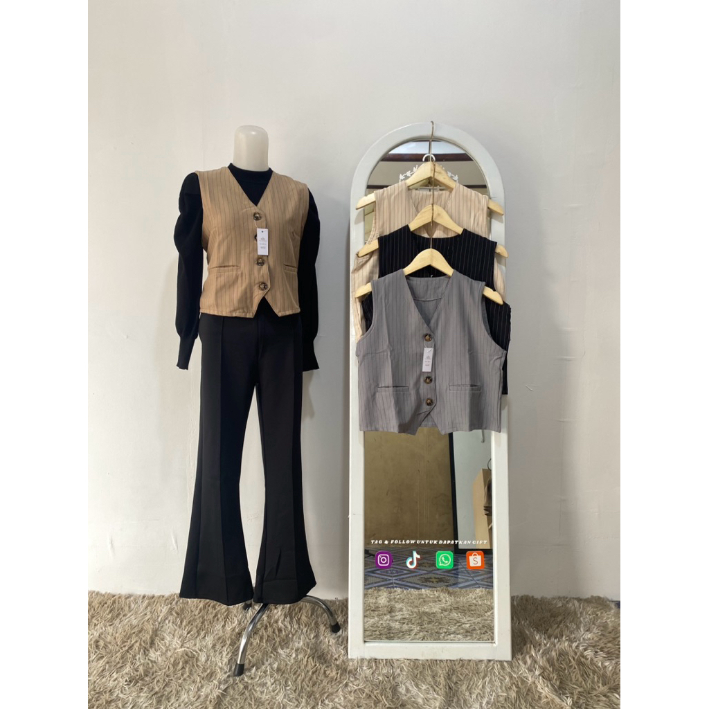 vest wanita motif salur kantong aktif